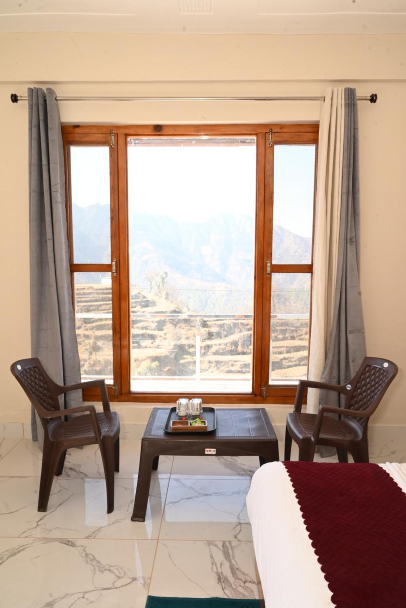 Himalayan Hill Top Resort คานาตัล ภายนอก รูปภาพ